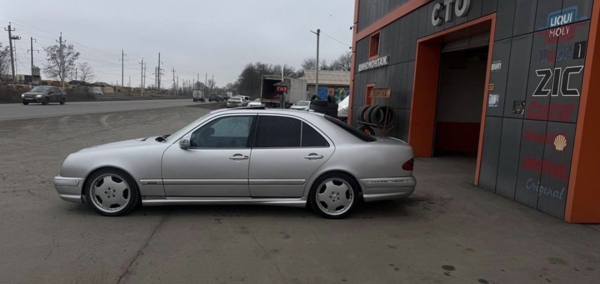 Мерседес 210